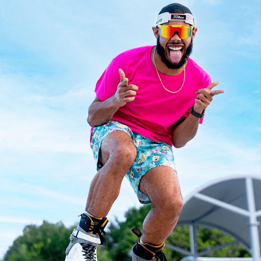 Narrow / Polarized Rainbow | Man posing wearing The 1993 Original from Pit Viper Sunglasses