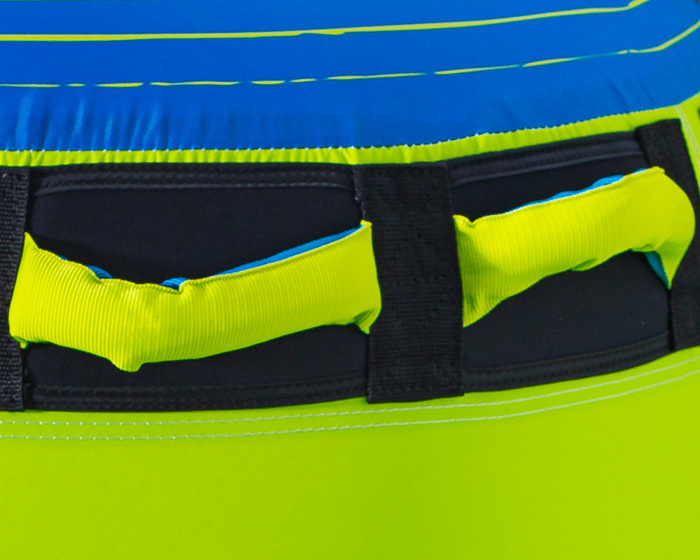 Close-up of blue and lime green OBrien Sombrero Towable Tube with black and green handles.