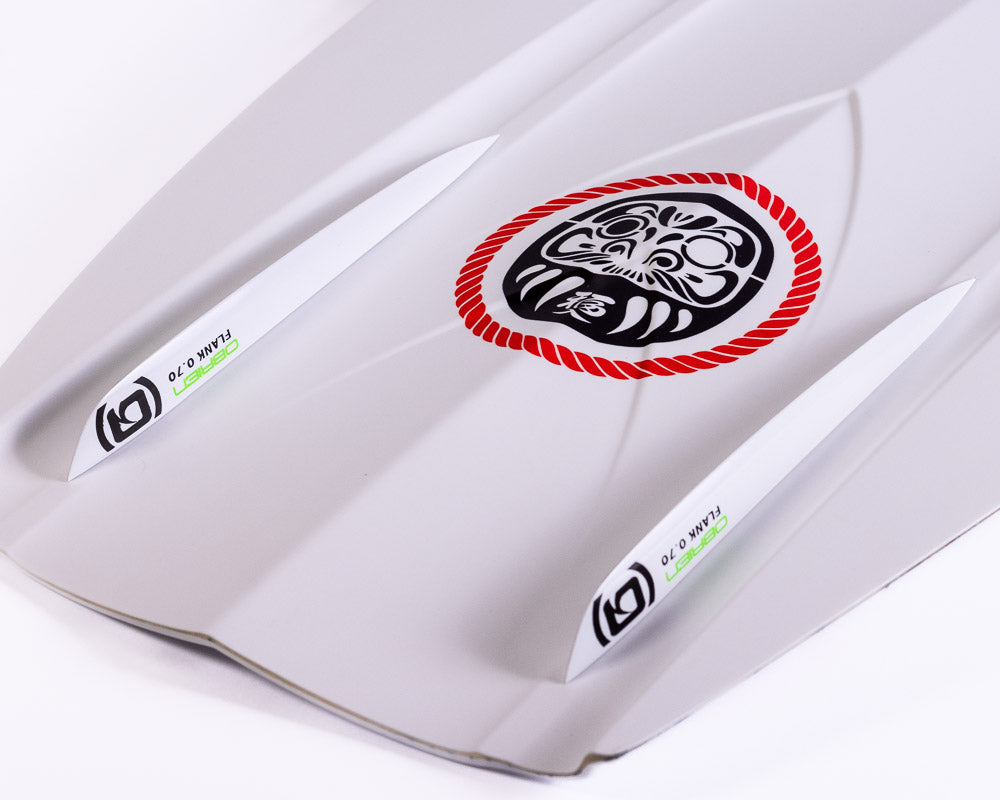 O'Brien Intent Wakeboard close-up of inset fins and channeling on the white base with black detailing.