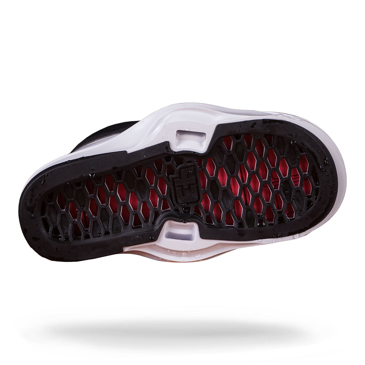 Liquid Force shoe sole with hexagonal black tread and red accents, similar to bindings, displayed against a white backdrop.