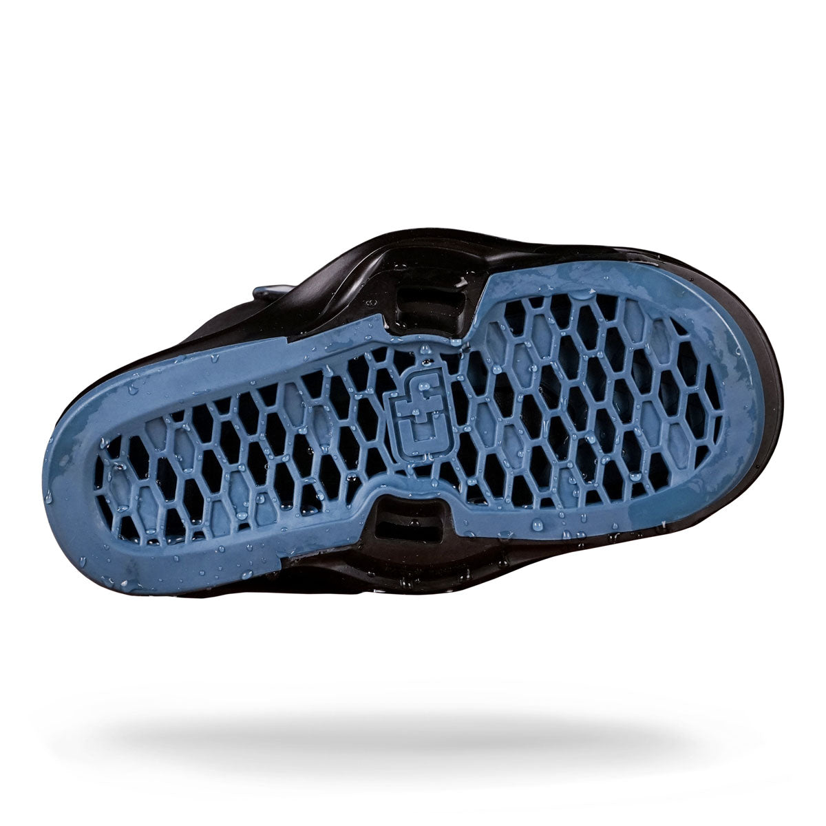 View from below of a Liquid Force shoe sole with a blue honeycomb pattern and water droplets, like wakeboard bindings.