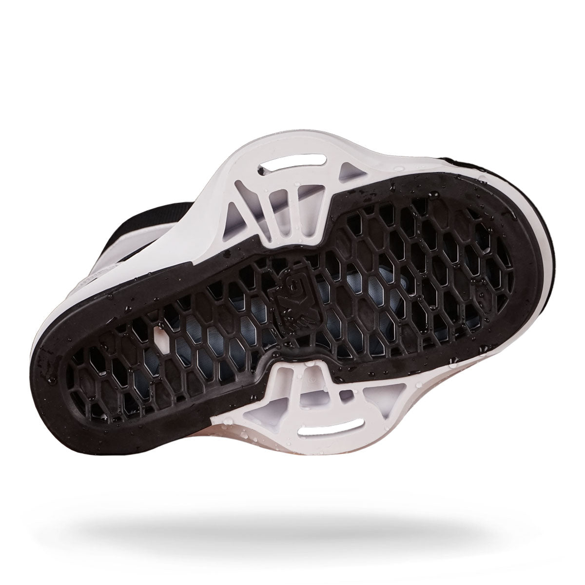 The bottom of this black and white Liquid Force bindings features a honeycomb-patterned sole.