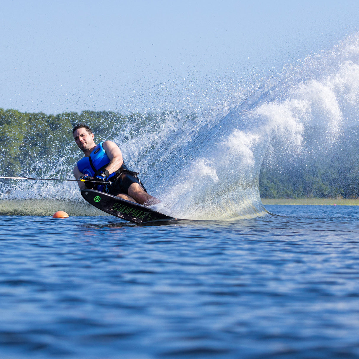 Close-up of the O'Brien Siege Slalom Waterski in action, displaying the ski's responsiveness.
