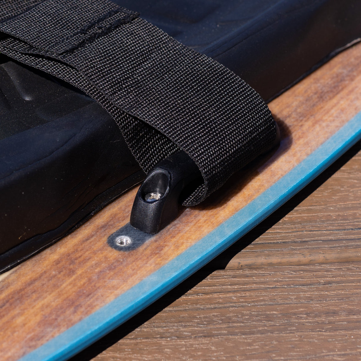 Zoomed view of the strap mounting hardware and sidewall detail on the O'Brien Enforcer Kneeboard.