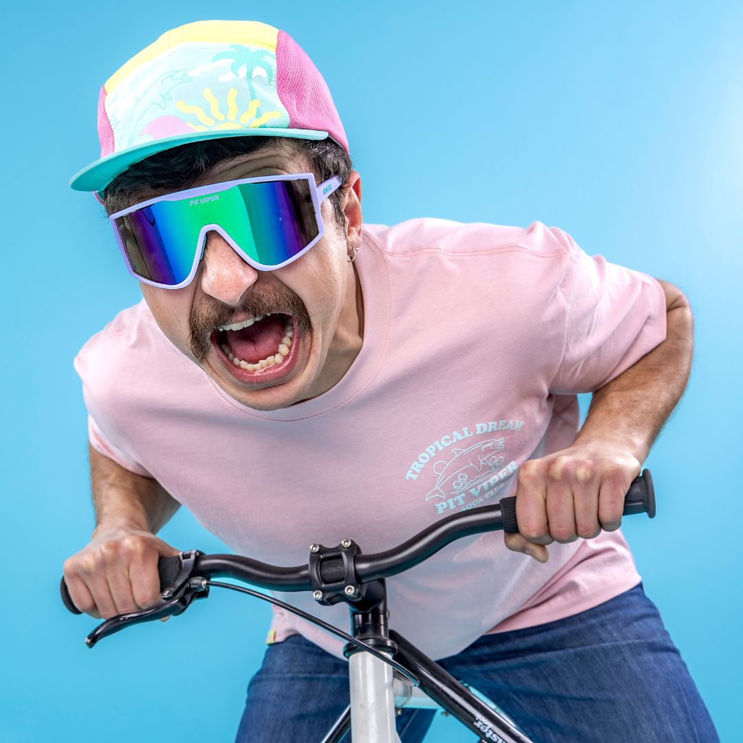 | you_want_to_buy_this.JPG | Man rides bike wearing The Moontower Try-Hard from Pit Viper Sunglasses