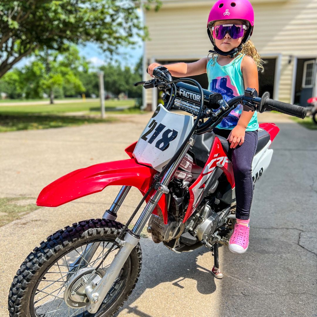 Narrow / Polarized Pink | the_last_image.JPG | Girl on a dirt bike wearing The LA Brights Original from Pit Viper Sunglasses