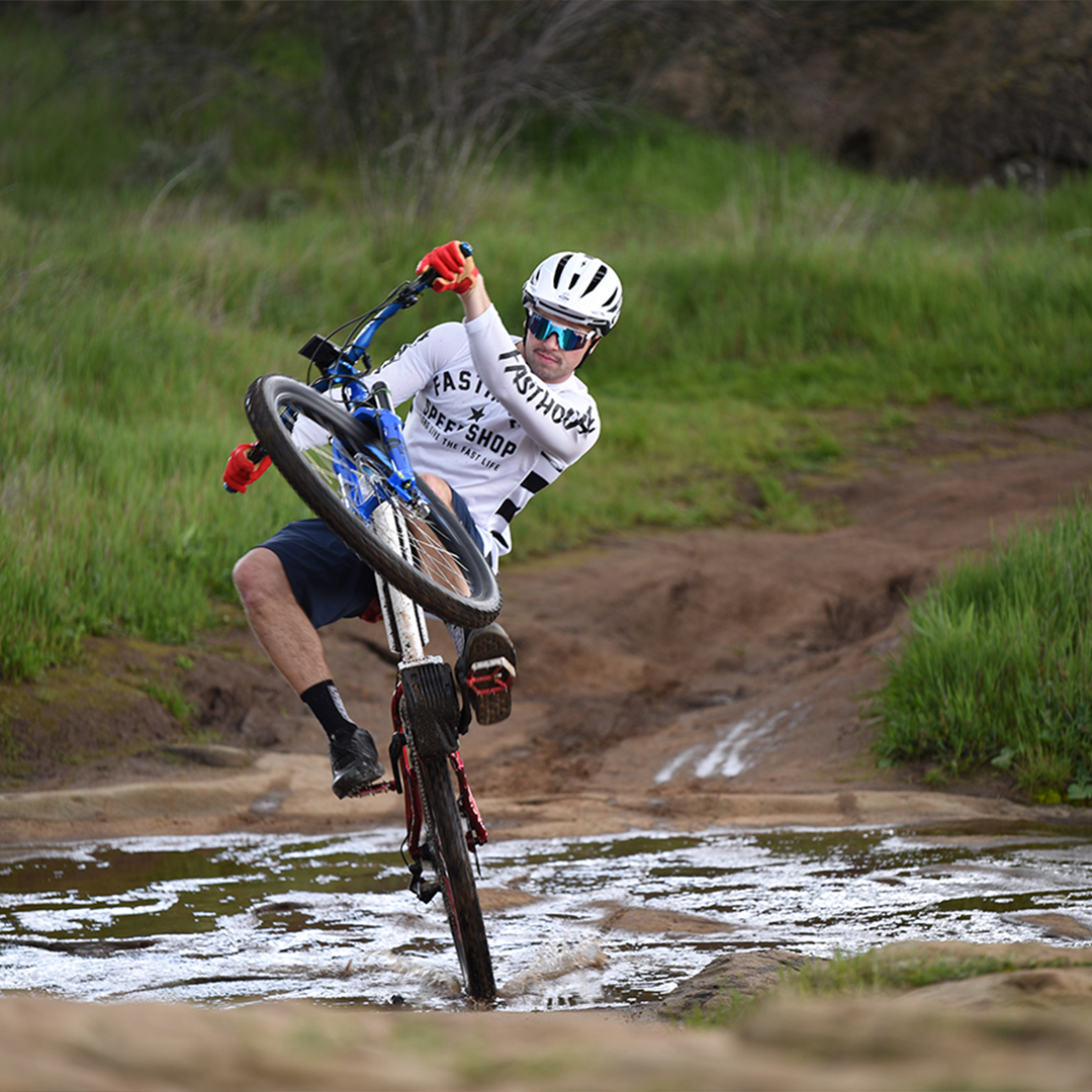 Wide / Polarized Blue | but_i_do_want_to_go_home.JPG | Man biking wearing The Merika Original from Pit Viper Sunglasses