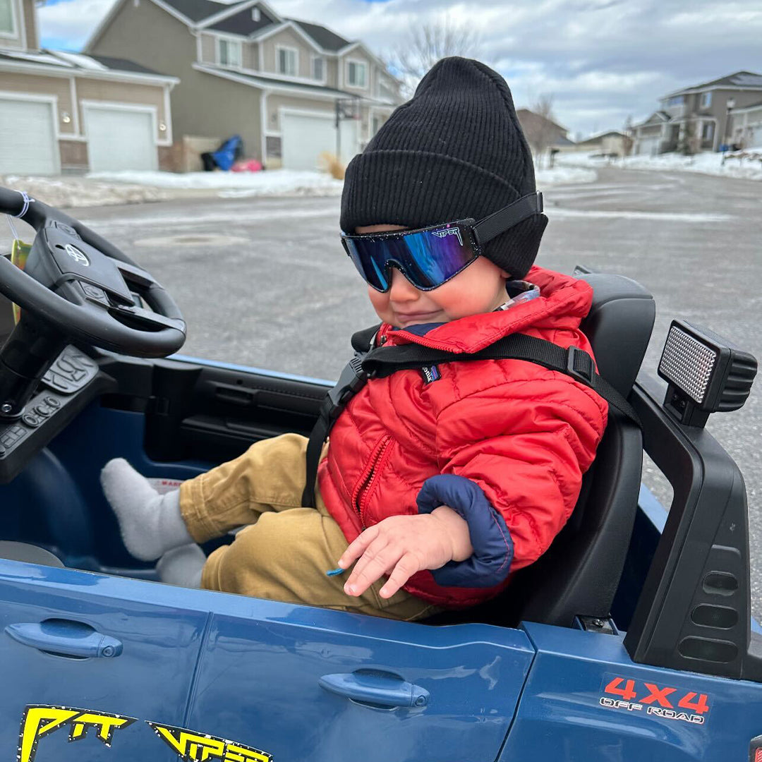 | orange.JPG | Baby driving a kids car in The Midnight Baby Vipes from Pit Viper Sunglasses
