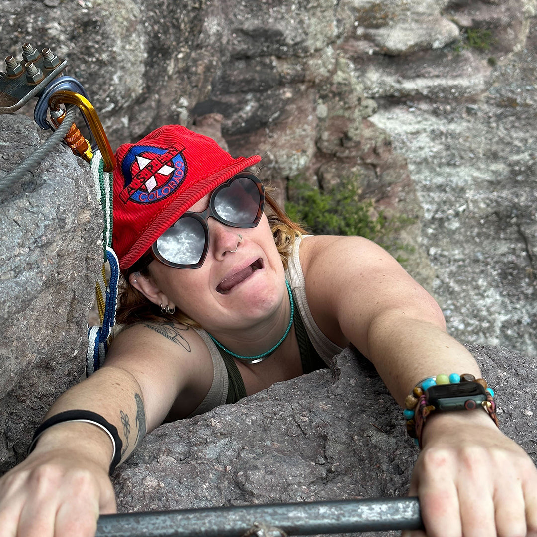 | guess_why.JPG | Woman rock climbing in The Landlocked Admirer from Pit Viper Sunglasses