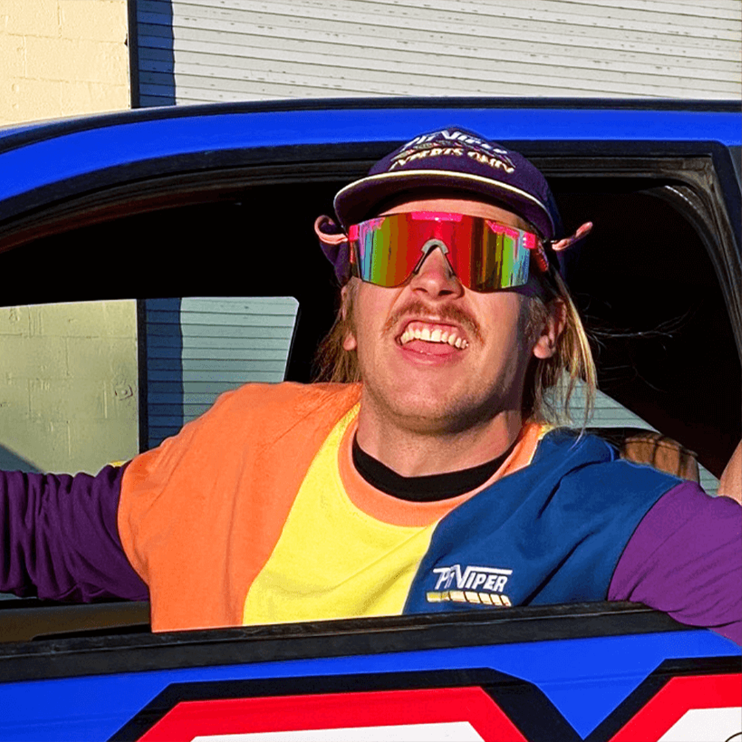 Wide / Polarized Rainbow | AHHHHHHH.JPG | Man in a car wearing The Radical Original from Pit Viper Sunglasses