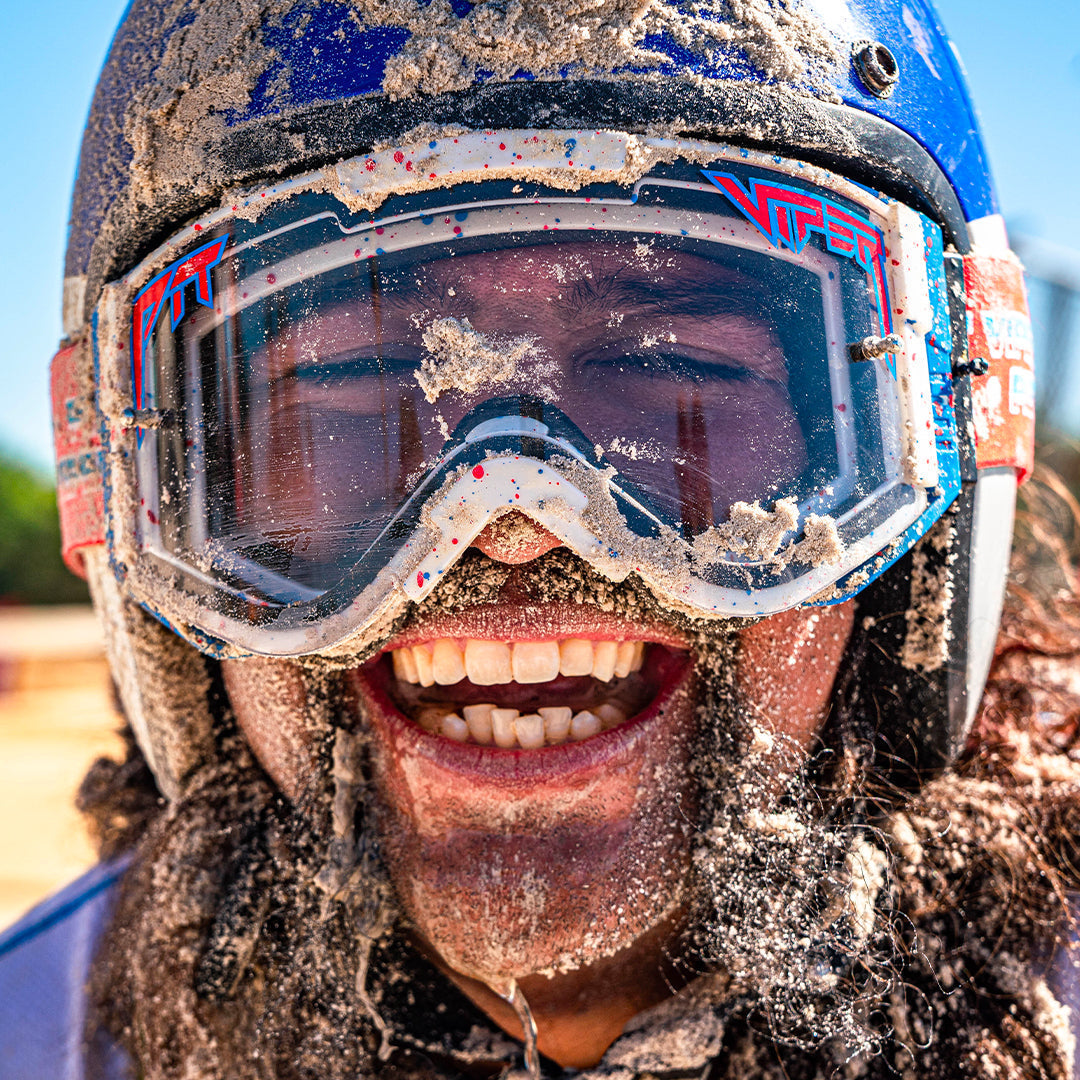 | here.JPG | Man smiling with dirt on his face wearing The Roost Rocket Brapstrap by Pit Viper Sunglasses