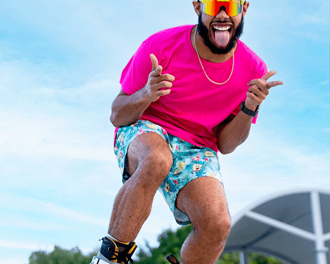 Narrow / Polarized Rainbow  | Man posing wearing The 1993 Original from Pit Viper Sunglasses