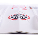 Bottom view of O'Brien Intent Wakeboard showing a black and red tribal-style logo near the center spine.