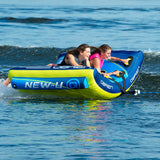 Smiling pair thrills on the water with the OBrien New-U 2 Towable Tube.