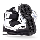 Black and white wakeboard boots with Velcro straps and hexagonal soles.