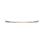 Side view of the Liquid Force M.E. FS wakeboard deck on white, showcasing its slight curve and thin profile.