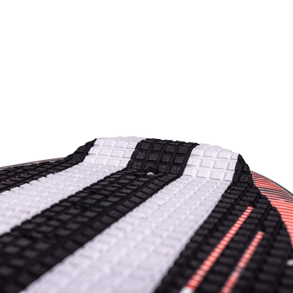 Closeup of the top rear black and white pad of the Driver wakesurf board.
