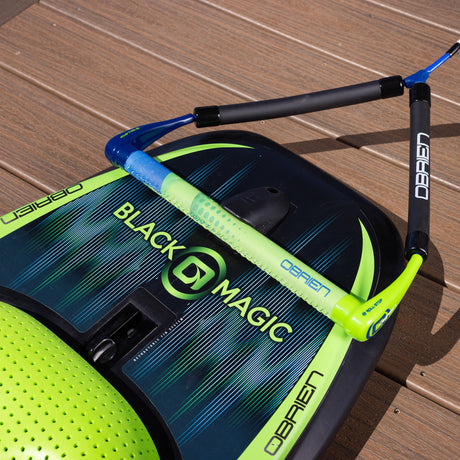Top view of O'Brien Black Magic Kneeboard with handle placed across green padded knee area.