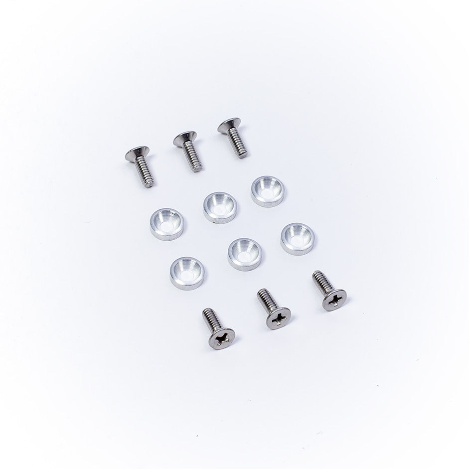 Set of screws, washers, and plastic inserts for mounting O'Brien waterski bindings.