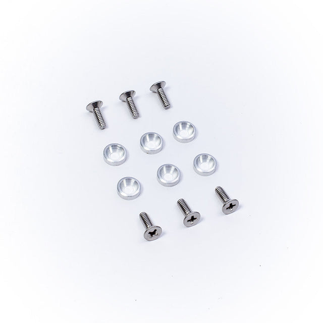 Set of screws, washers, and plastic inserts for mounting O'Brien waterski bindings.