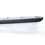 White O'Brien plastic fin attached to a board, featuring a curved shape with multiple holes for mounting.