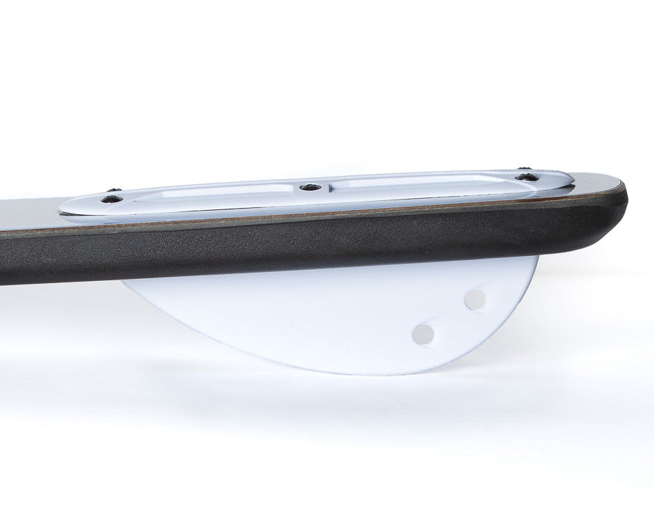 White O'Brien plastic fin attached to a board, featuring a curved shape with multiple holes for mounting.