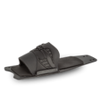 Angled view of the O'Brien X-9 RTP, a black rear toe plate with a molded rubber overlay and cushioned footbed.