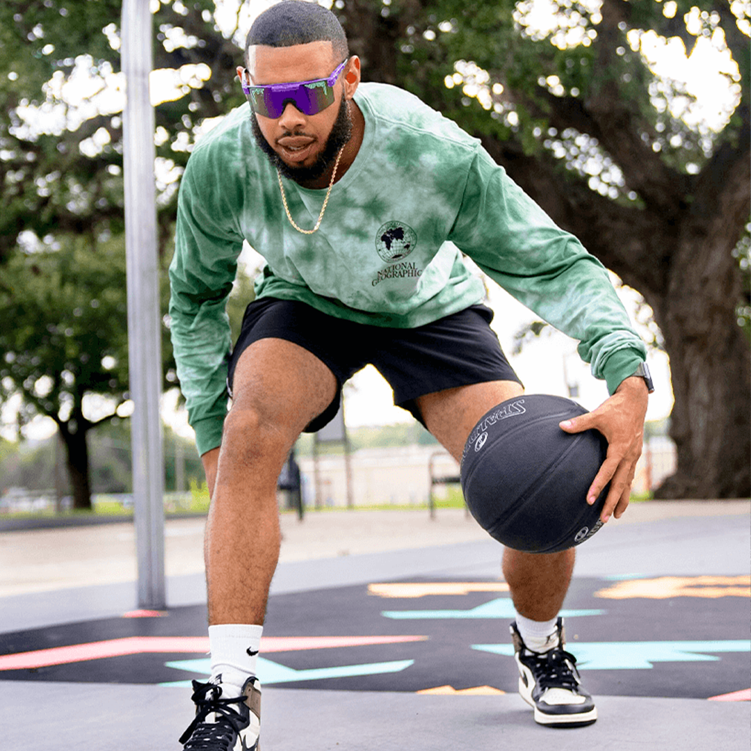 Narrow / Polarized Purple | organize_image_files.JPG | Man playing basketball wearing The Donatello Original from Pit Viper Sunglasses