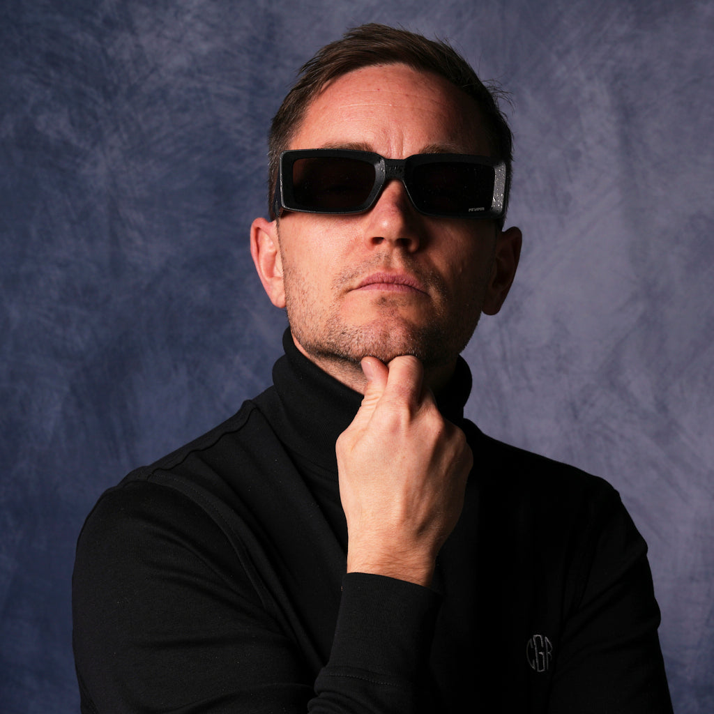 | steve-the-man.JPG | very important businessman wearing a turtleneck and square frame sunglasses