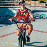 Wide / Polarized Pink | walked_in_on_me.JPG | Man on a BMX bike wearing The Gobby Original from Pit Viper Sunglasses