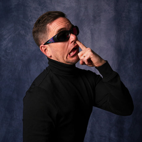 / Pink-Purple | steve-the-man.JPG | very important businessman picking his nose wearing sunglasses with purple frames on them