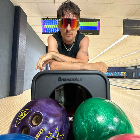 / Rainbow | no_problem.JPG | A man at a bowling alley wearing Pit Viper Sunglasses