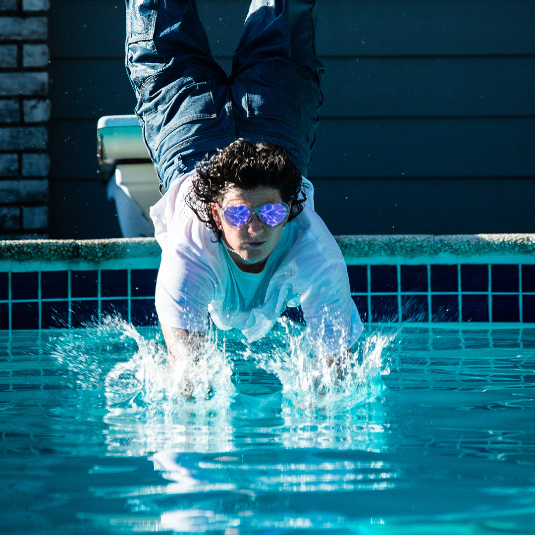 / Pink | You_moved_you’re_out.JPG | Man diving into a pool in The Rainbow Jellies Admirer from Pit Viper Sunglasses
