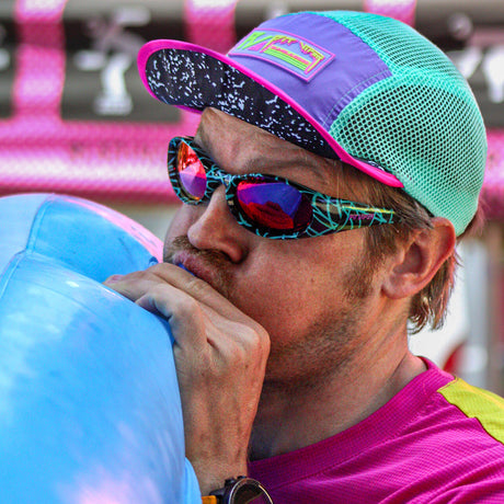  | AHHHHHHHHHHH.JPG | Man blowing up a pool toy wearing The Voltage Slammer from Pit Viper Sunglasses